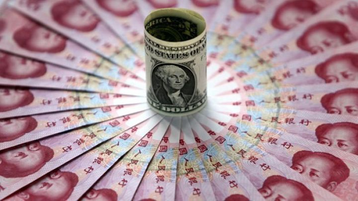 Yuanın rəsmi məzənnəsi 11 ildə ilk dəfə 7-nin üzərində müəyyən edildi - MƏZƏNNƏ MÜHARİBƏSİ